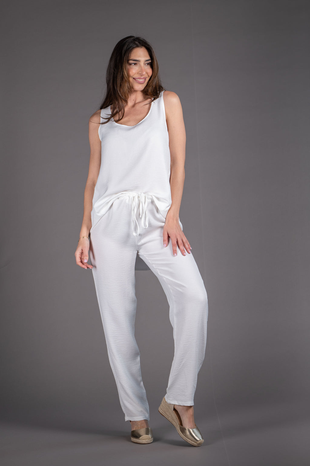 Conjunto pantalón y top en simil lino blanco